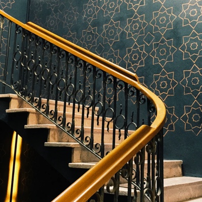 stairs with patterns on the wall